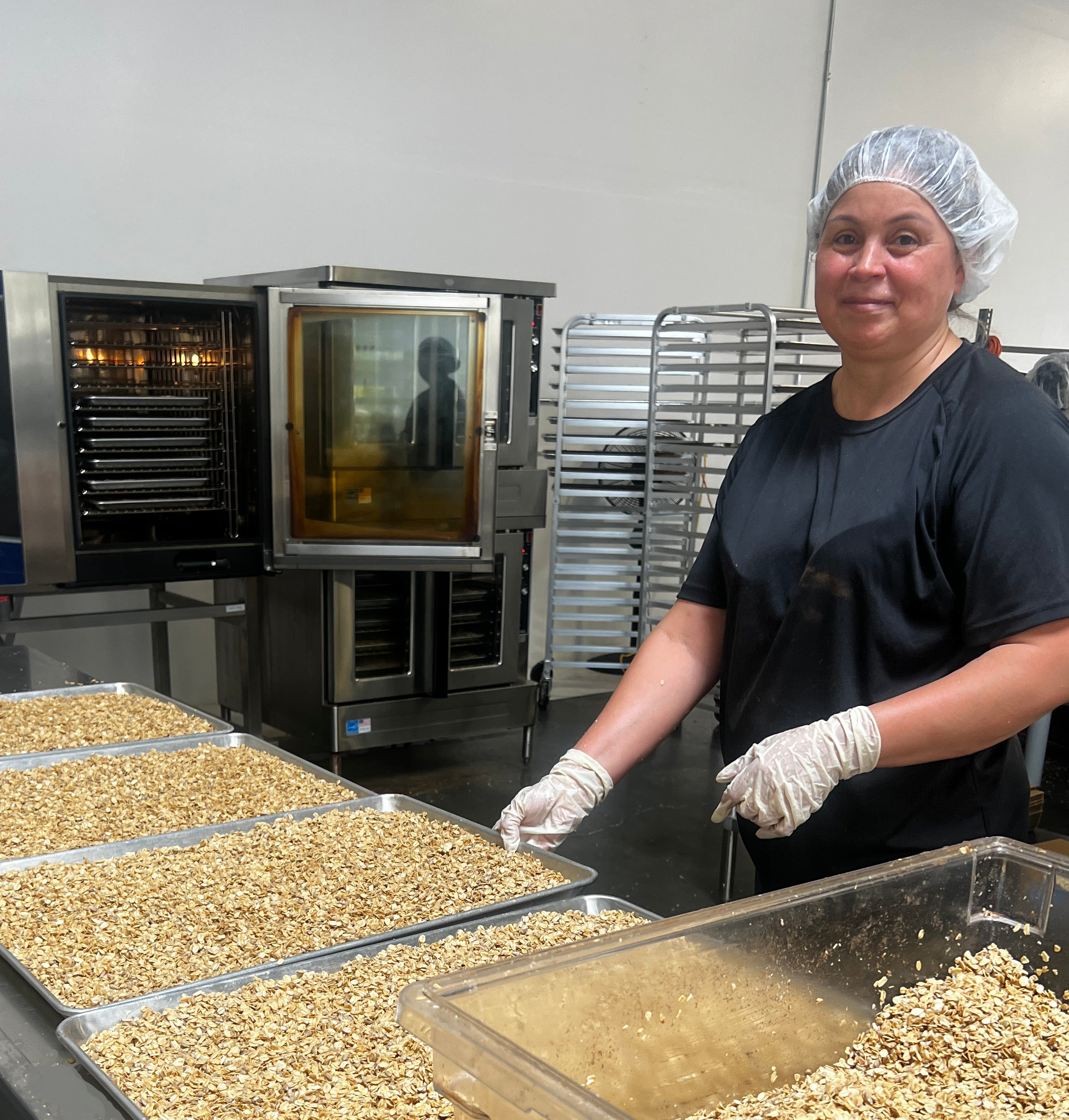 Virtue Foods granola production team handcrafting bulk granola in Vacaville Northern California commissary